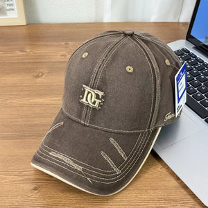 Brown distressed baseball cap with DG logo and contrast stitching.