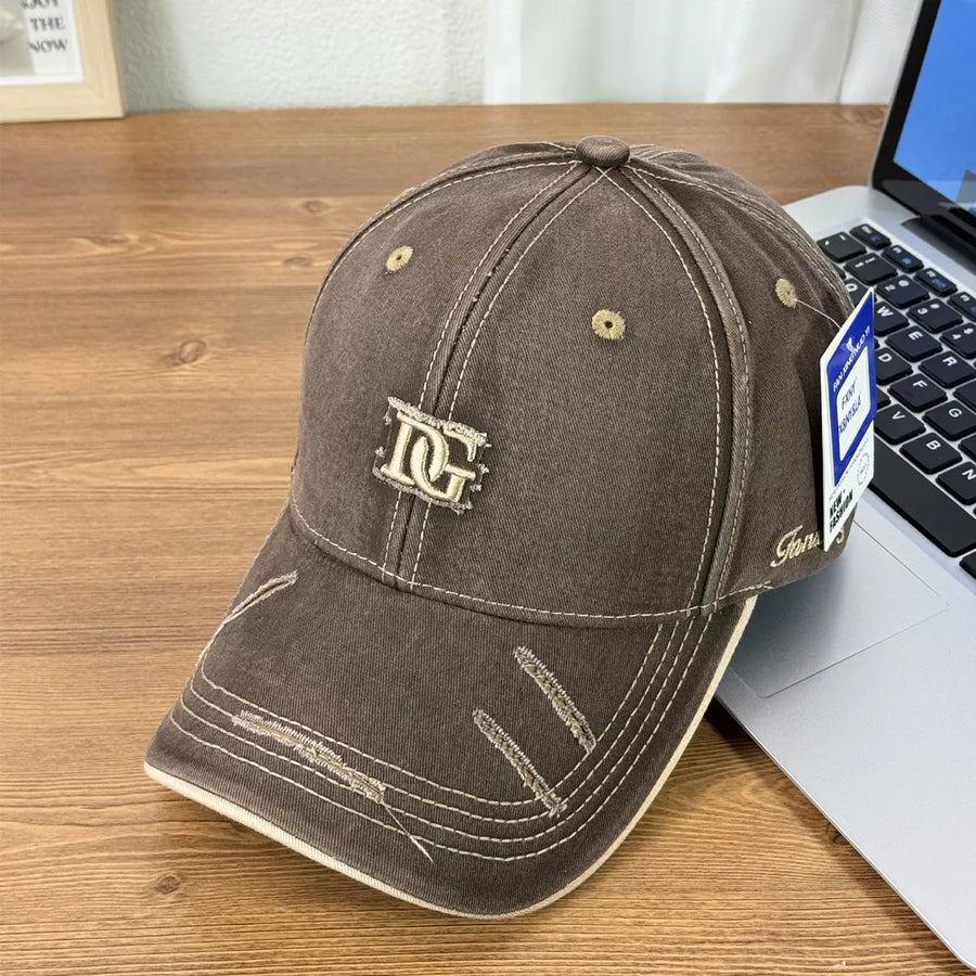 Brown distressed baseball cap with DG logo and contrast stitching.