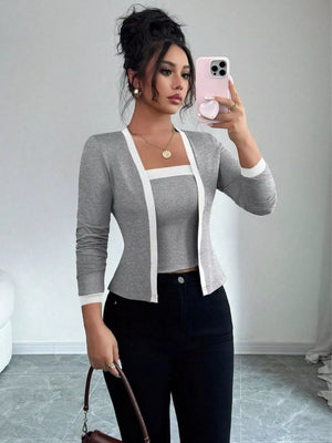 Gray two-piece cardigan set with white trim and a square neck tank top.