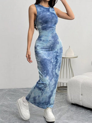 Vibrant tie-dye maxi dress in sea blue with a bodycon fit and sleeveless design.