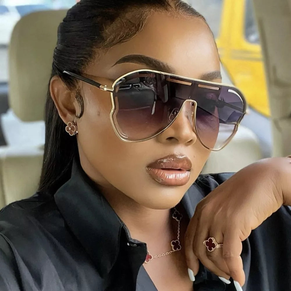 Statement aviator gradient sunglasses with gold metal frames and oversized lenses