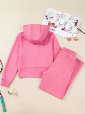 Dusty pink relaxed fit zip-up hoodie and drawstring pants set.