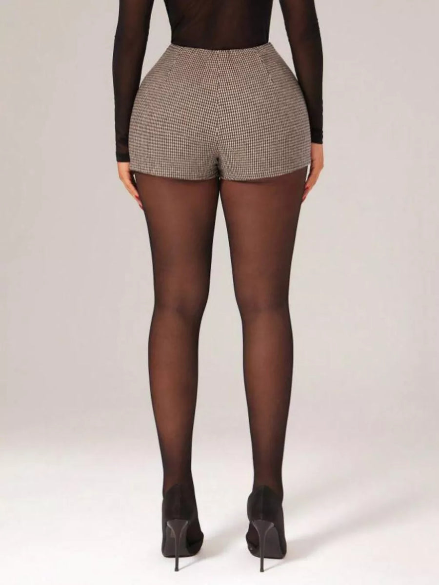 Chic houndstooth high-waisted shorts with a belted detail.
