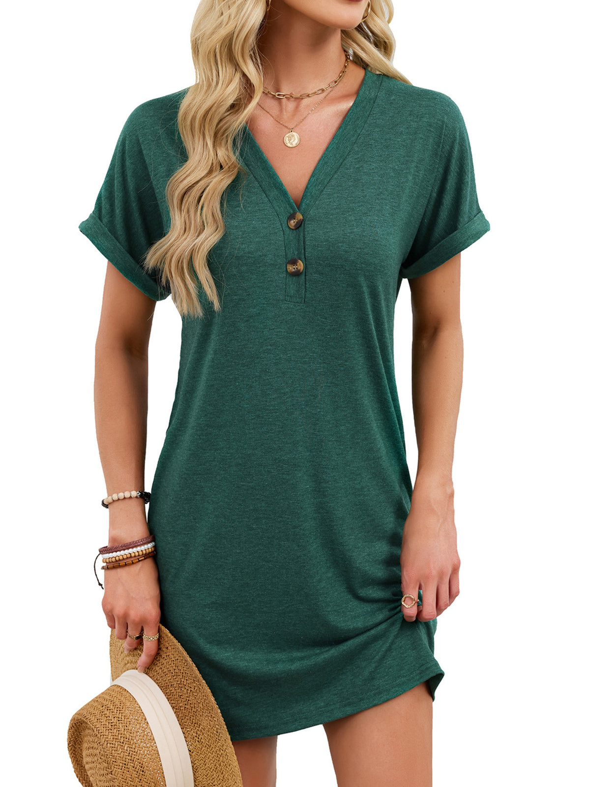 Dark green t-shirt dress with V-neck, decorative buttons, and cuffed sleeves.
