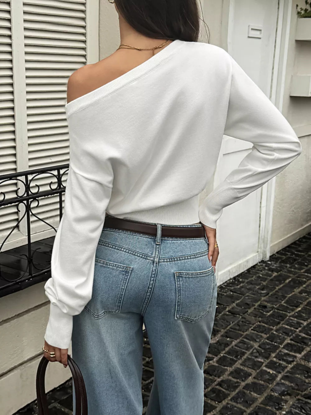 White one-shoulder top with stretch and long sleeve