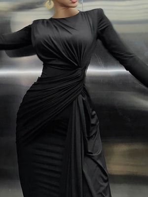 Black ruched knot front maxi dress with long sleeves and a draped skirt.