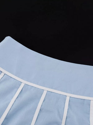 Light blue cotton corset top with white piping detail and boning.