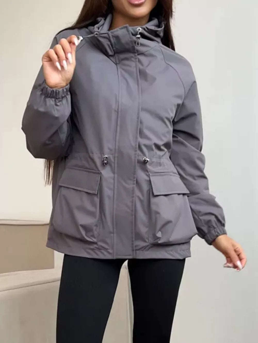 dark brown windbreaker with pocketed and long sleeve