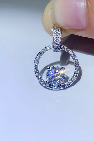 Silver halo moissanite circle pendant necklace with pave set stones on 925 sterling silver.