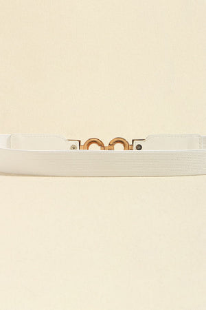 White elastic belt with gold interlocking buckle detail