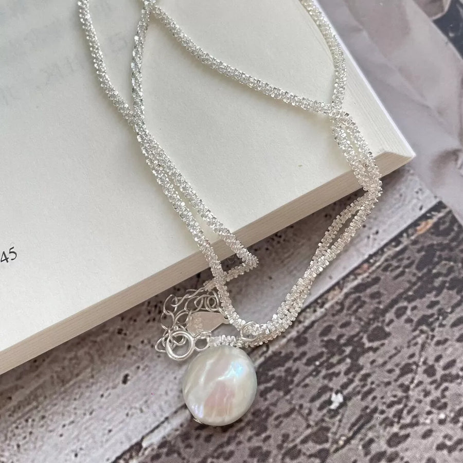 necklace in silver with pearl pendant and choker