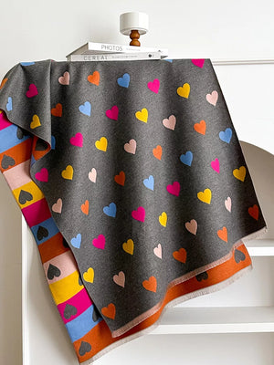 Gray scarf with colorful heart print and striped edge detail