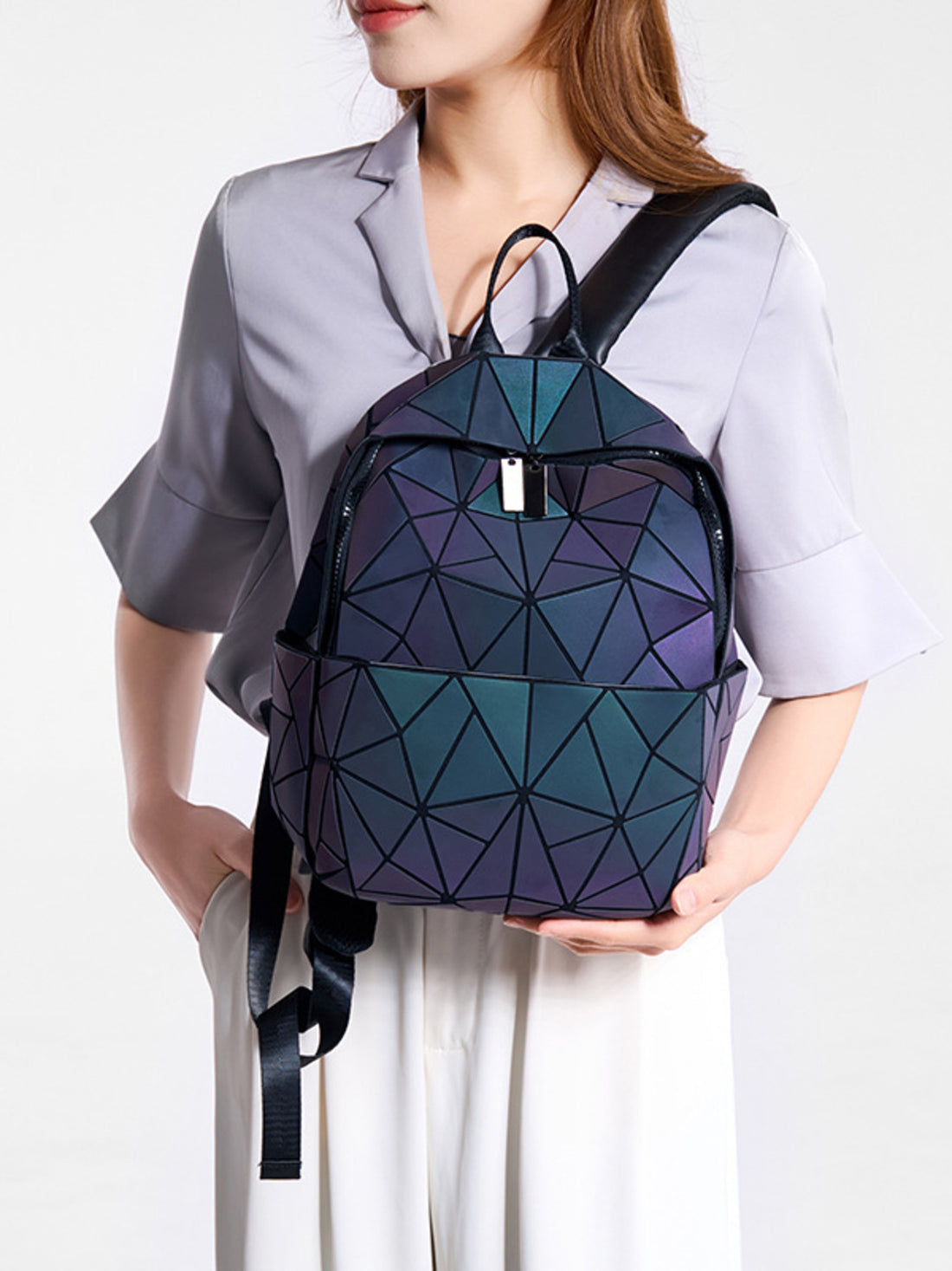 backpack in black featuring adjustable straps and structured fit