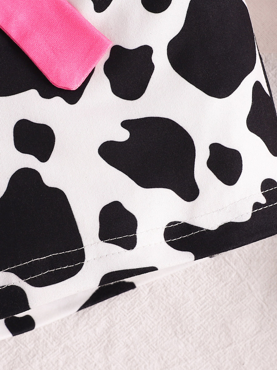 Baby cow print tank top with pink bow detail, cotton.