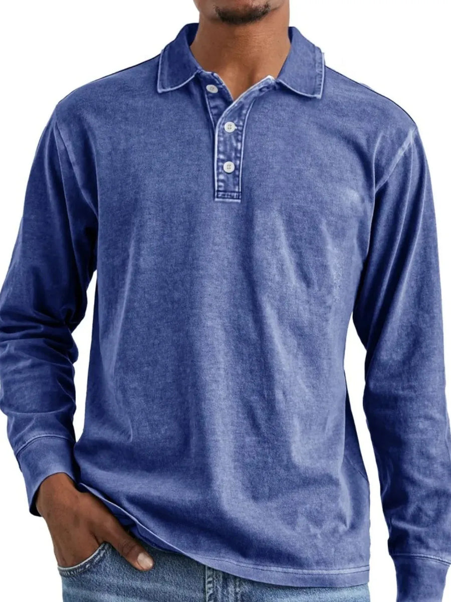 Long-sleeve polo shirt in Dusty Blue with vintage wash and button placket.