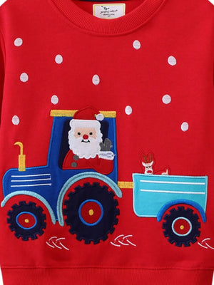 Red crew neck sweatshirt with Santa driving a blue tractor and a reindeer in the trailer.