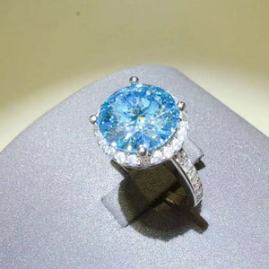 925 sterling silver,Moissanite Carat weight: 1ct Care instructions: Avoid wearin ring in Sky Blue with jewelry silhouette