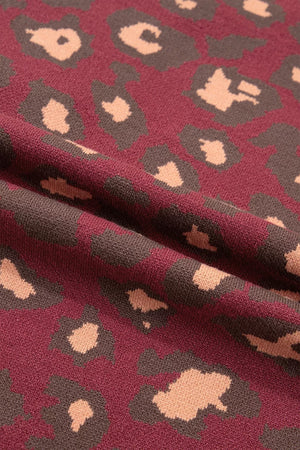 pullover sweater featuring leopard in Deep Red with 52% viscose, 26% polyester, 22% polyamide Care instructions: Machine
