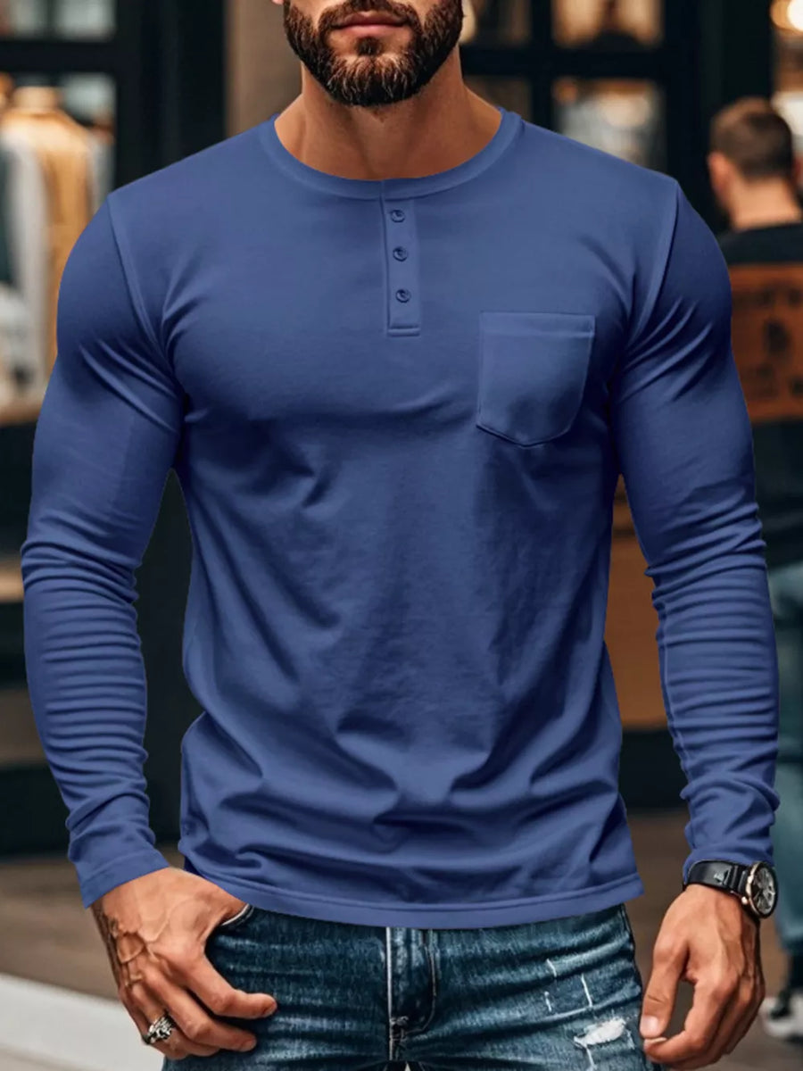 Men's Cowboy Blue long sleeve Henley t-shirt with button placket and chest pocket.