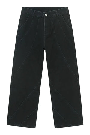 Dark denim trousers with sculpted seam detailing and a wide leg.