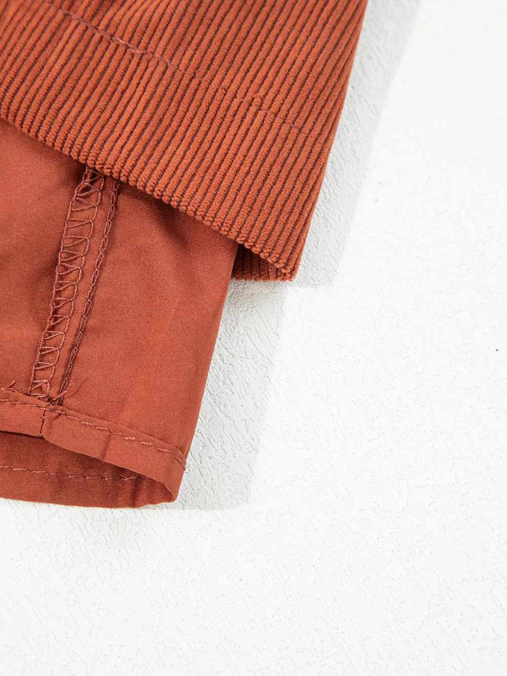 Button Decor Scalloped Edge High Waist Corduroy Shorts in rust with buttoned