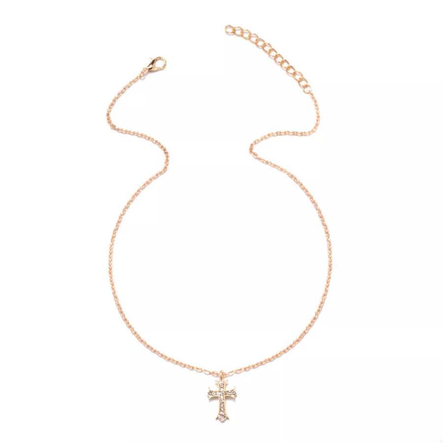 Gold rhinestone cross pendant necklace with delicate chain