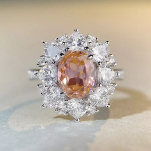 ring in peach featuring zircon stones and fitted fit