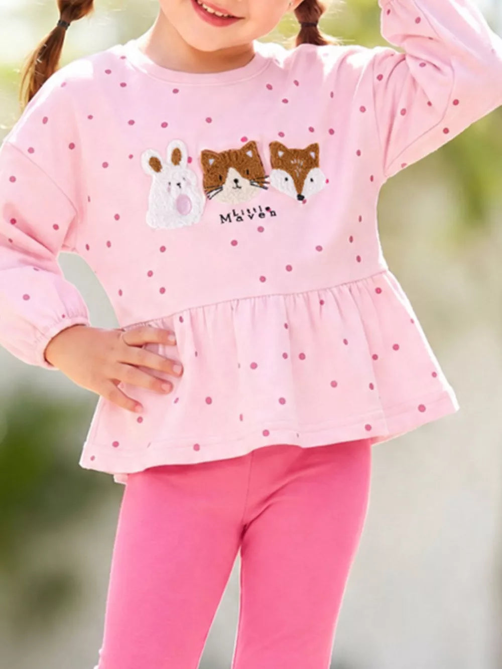 90% cotton, 10% polyester Care instructions: Machine wash cold peplum top in Pink with A-line silhouette