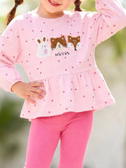 90% cotton, 10% polyester Care instructions: Machine wash cold peplum top in Pink with A-line silhouette
