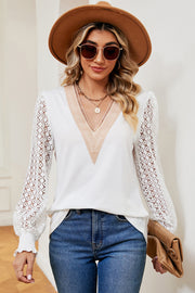 White knit top with lace sleeves and V-neck trim