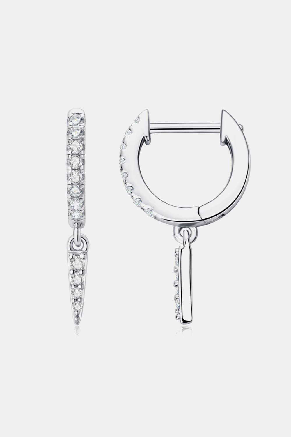 Silver pavé spike huggie earrings with dangling spike charms.