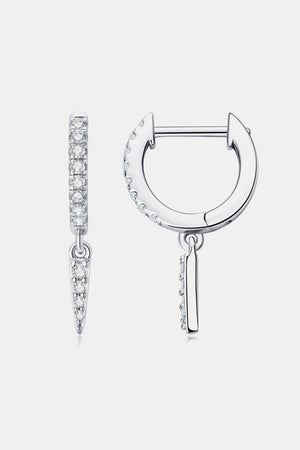 Silver pavé spike huggie earrings with dangling spike charms.