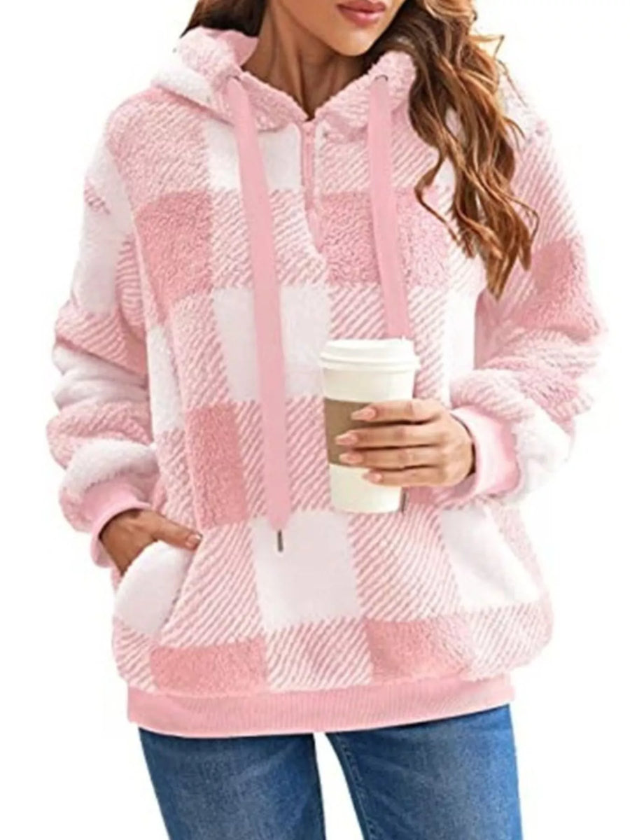 Pink and white plaid sherpa drawstring hoodie with a half-zip and front pocket.