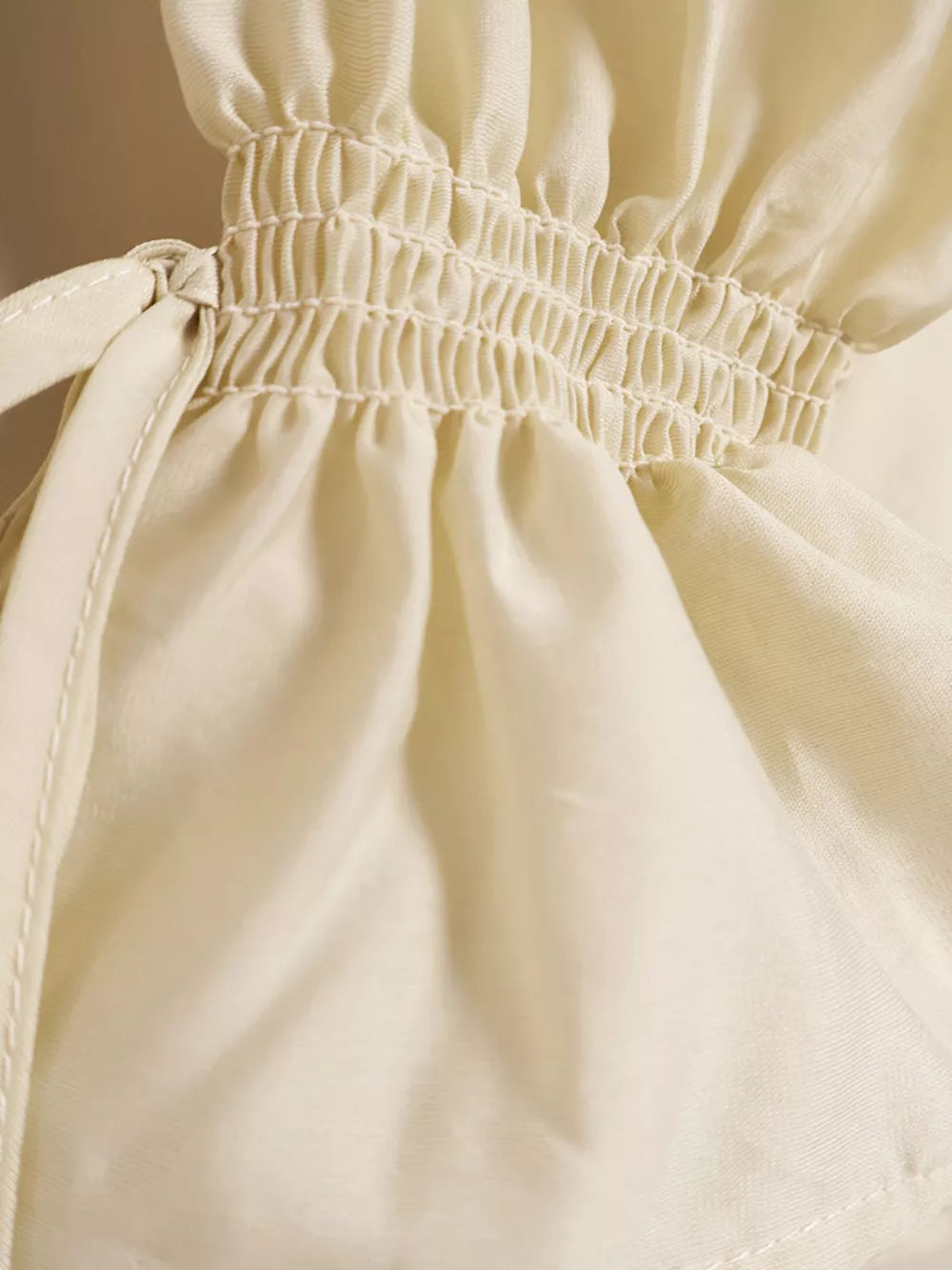 ivory blouse with ruffled and long sleeve