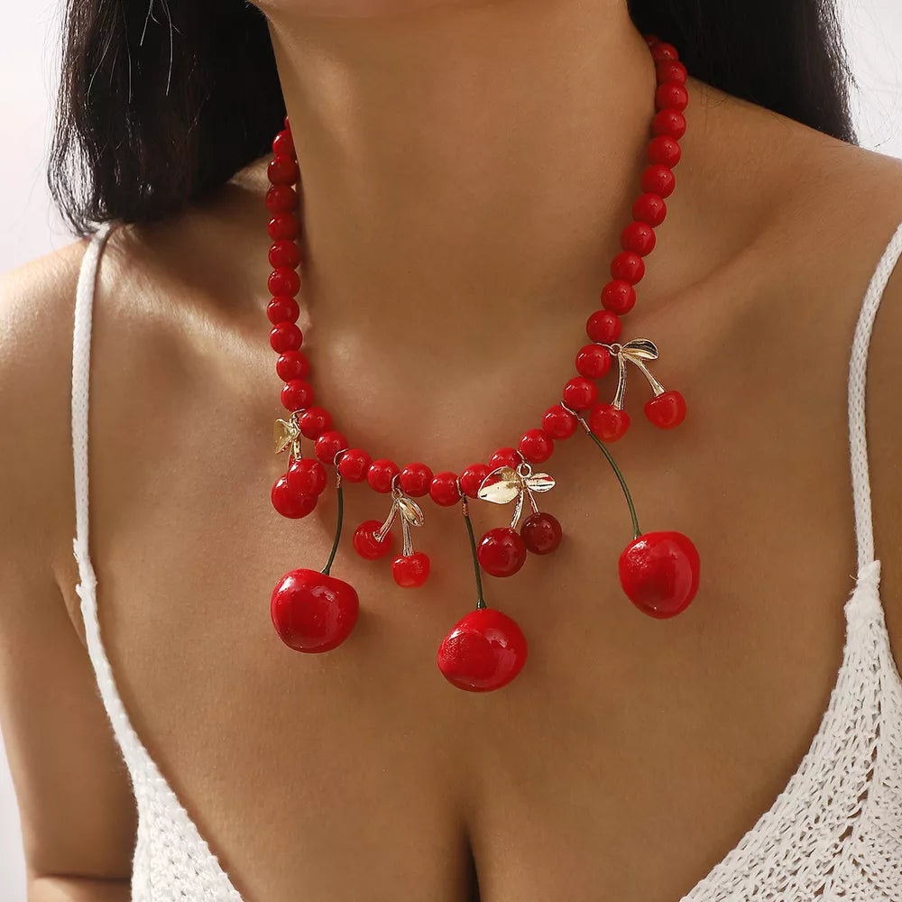 necklace in red featuring beaded and statement fit