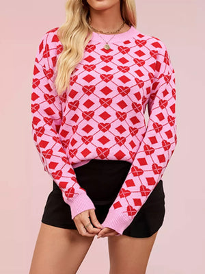 red pullover sweater with ribbed hem and long sleeve
