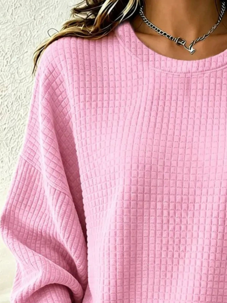 Pink sweatshirt featuring waffle-knit and waffle-knit