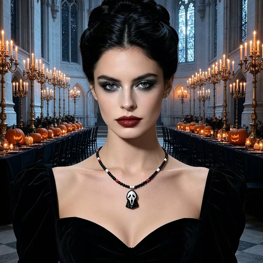 white necklace featuring beaded and character-motif