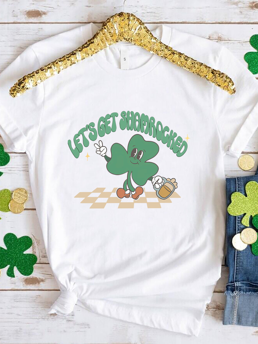 White graphic t-shirt with a retro shamrock character holding a beer and text that says Let's Get Shamrocked.