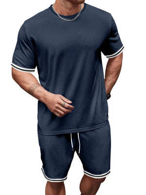 Navy blue t-shirt and shorts set with white striped trim on sleeves and hem