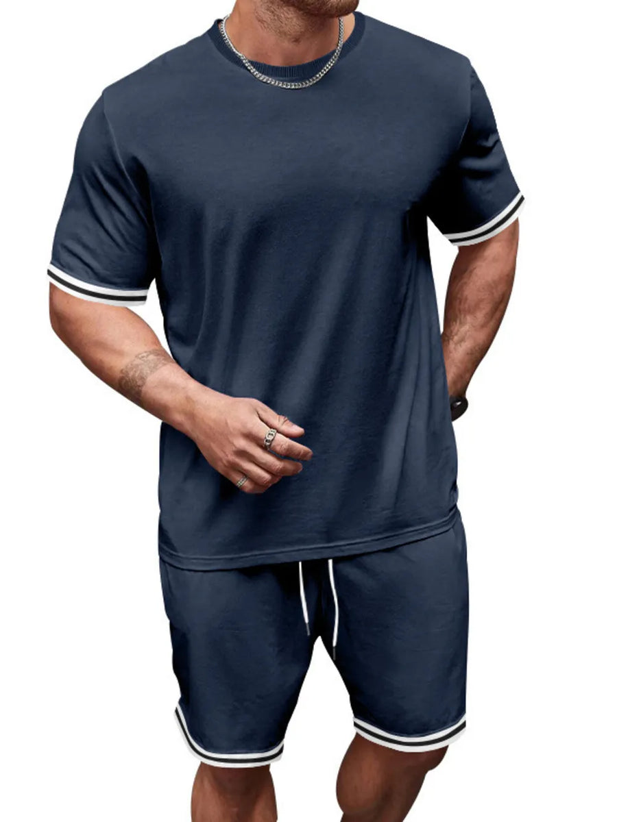 Navy blue t-shirt and shorts set with white striped trim on sleeves and hem