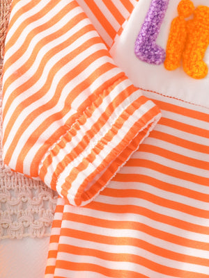 sweatshirt in Orange-red with chenille patch and hip-length