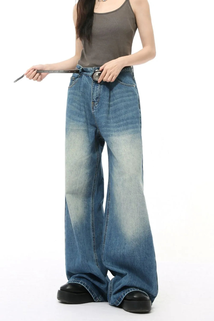Oversized denim palazzo jeans in French Blue with subtle wash and wide leg.