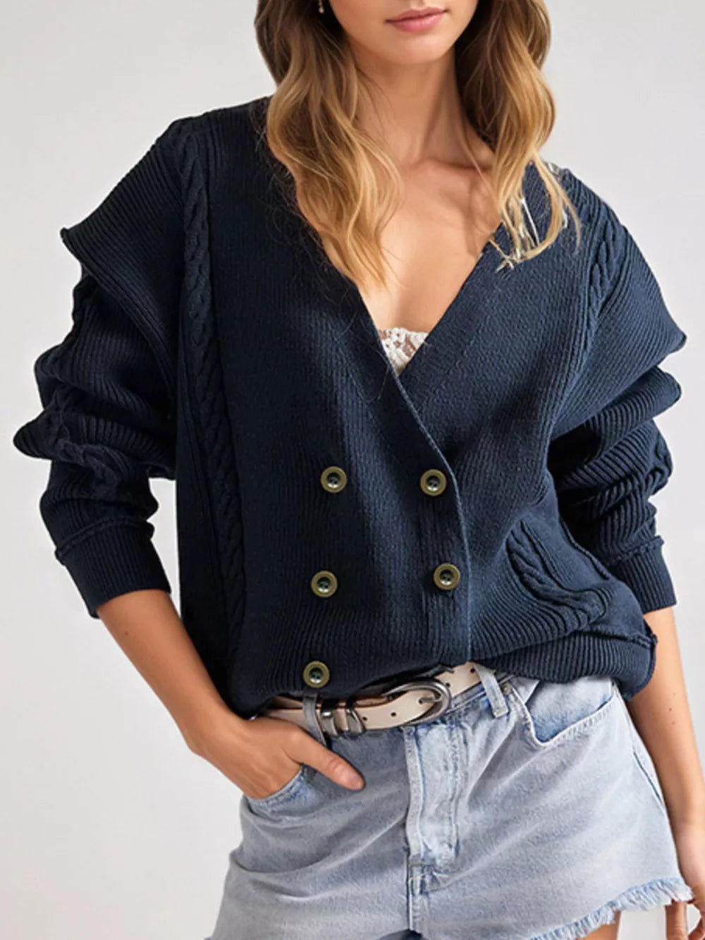 navy blue cardigan with cable knit and v-neck