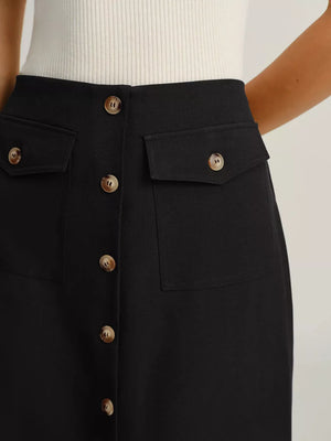Black midi skirt with button front and dual flap pockets.