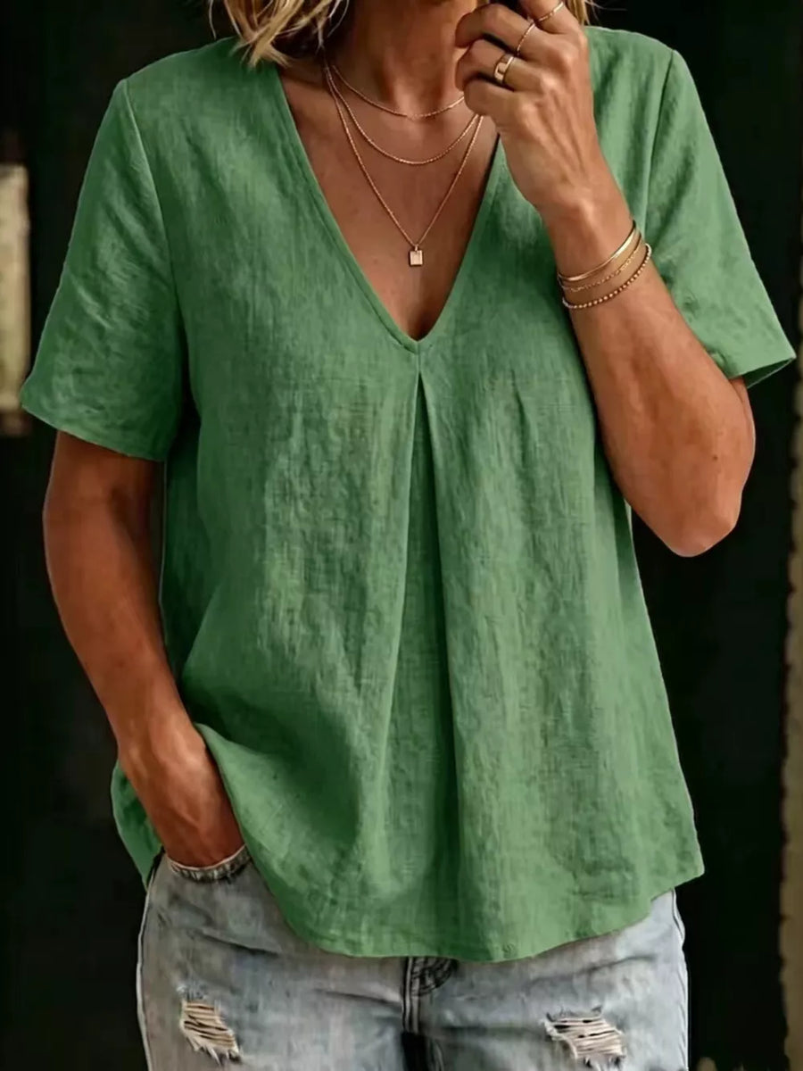 Green linen blend v-neck short sleeve top with front pleats