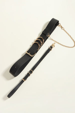 Black PU leather harness belt with gold chain detail and multiple rings