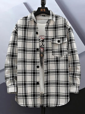 Oversized flannel button-up shirt in white grid pattern with two chest pockets.