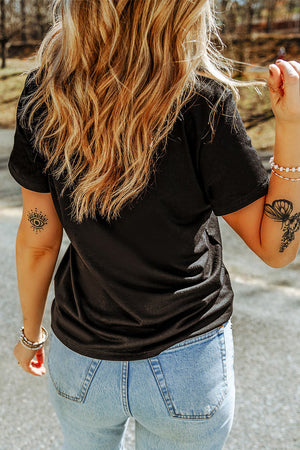Black t-shirt with short sleeves and a crew neck, featuring a leopard skull graphic.