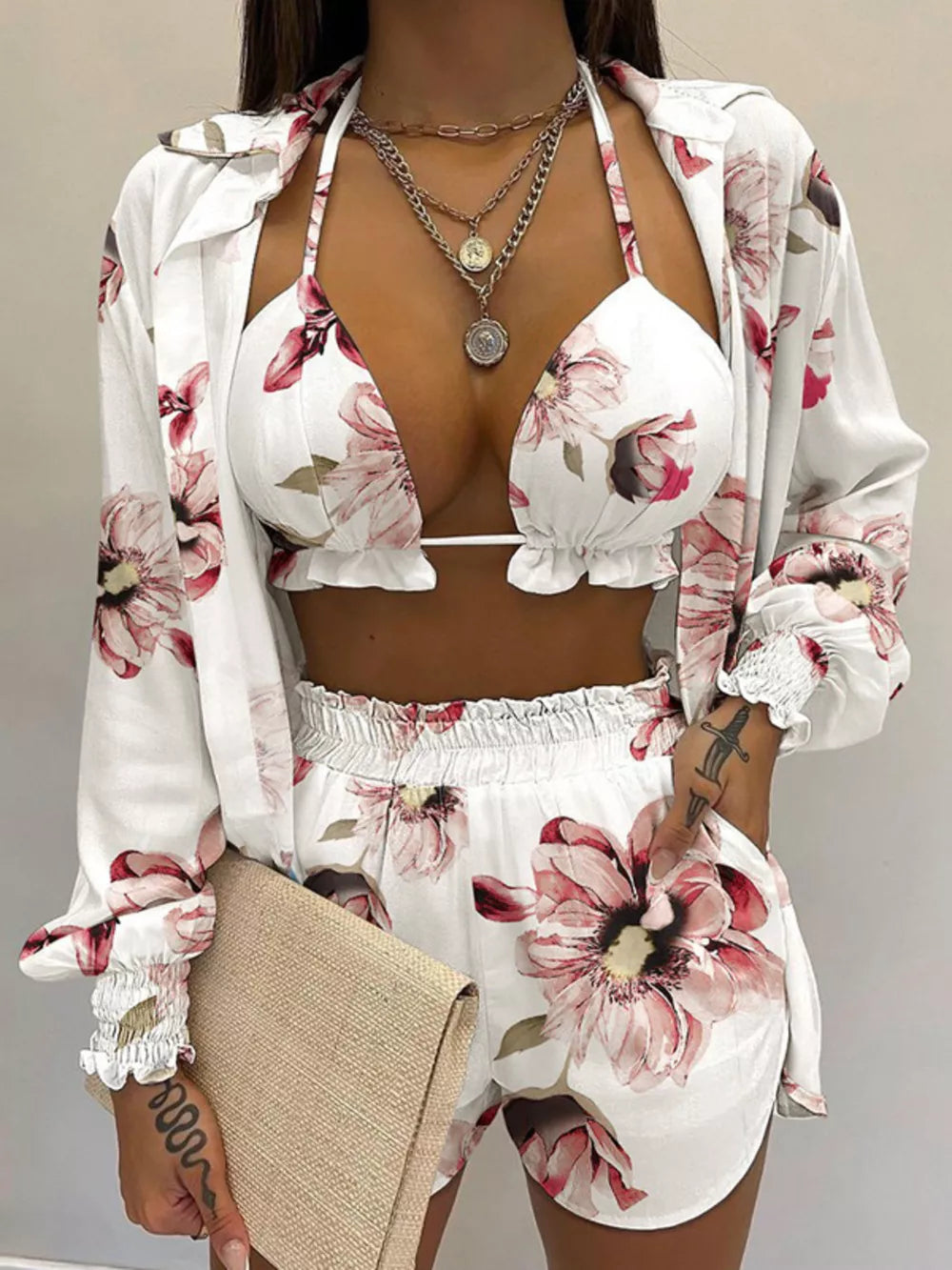 Floral print two-piece outfit set with ruffled bikini top and shorts, ivory color